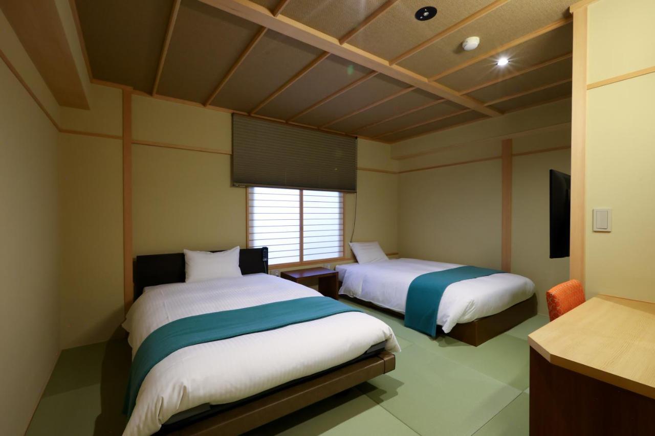Hotel Tamanoyu Matsumoto Buitenkant foto